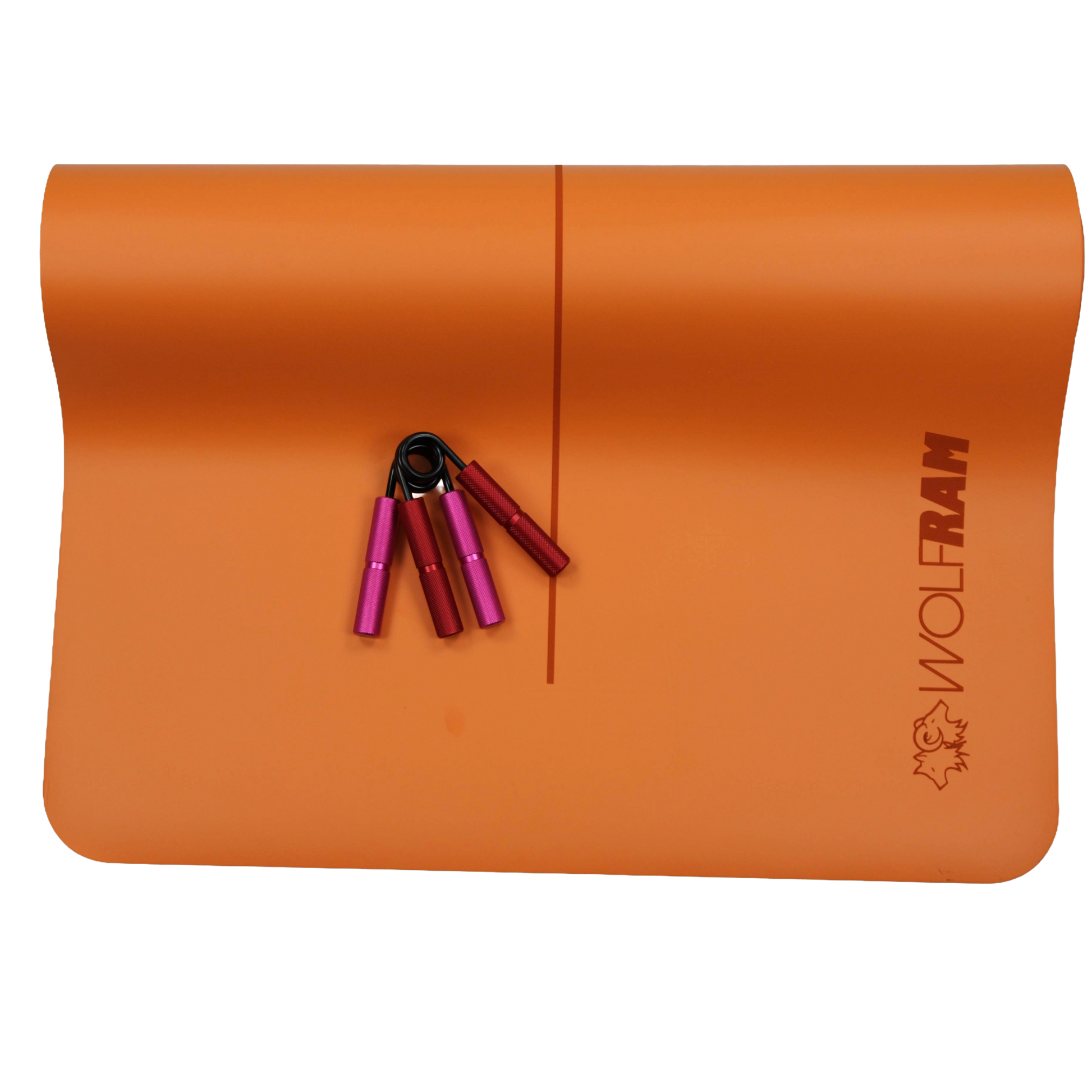 Orange Wolfram Fitness yoga mat paired with one pink and one red hand grip, showcasing mixed-resistance grip trainers for wrist and forearm conditioning.