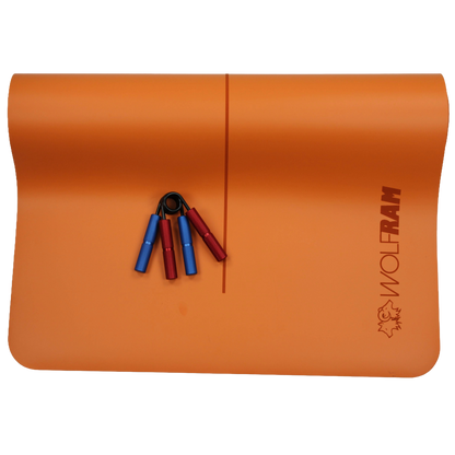 Orange Wolfram Fitness yoga mat paired with a blue and a red hand grip, providing mixed-resistance grip trainers for strength workouts.