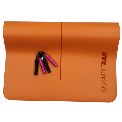 Wolfram Fitness orange yoga mat displayed with a pink and black hand grips in 45kg and 68kg resistance, designed for grip-strength and forearm training.