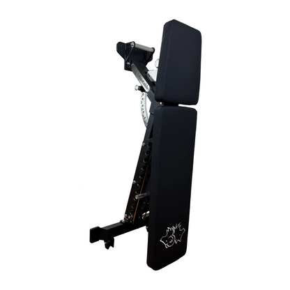 Wolfram Fitness zero-gap adjustable weight bench shown in the upright storage position for space-saving home gym setup