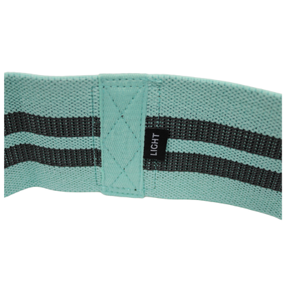 Green light-strength knitted Wolfram Fitness booty band designed for gentle resistance, glute activation, and lower-body workouts.