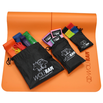 Orange Wolfram Fitness yoga mat displaying all resistance band sets in their bags, including the 6-piece long bands, 5-piece latex booty bands, and 3-piece knitted bands
