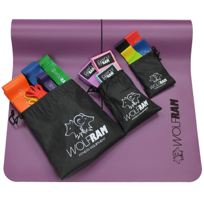 Purple Wolfram Fitness yoga mat showcasing all resistance band sets in their bags, including the 6-piece long resistance bands, 5-piece latex booty bands, and 3-piece knitted bands